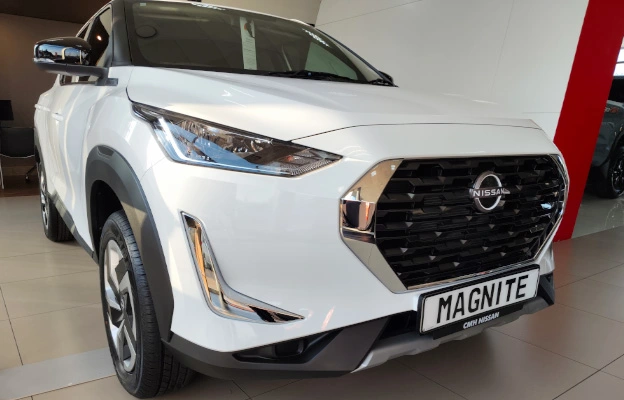 White Nissan Magnite Side Front View